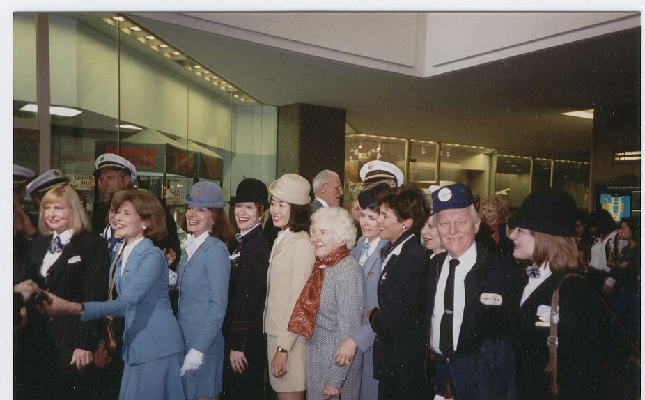 In 1994 a plaque was dedicated to the memory of Pan Am in the lobby of what had been the Pan Am Building and is now the Met Life Building.  Pan Am employees were invited to participate and encouraged to wear old uniforms.  Madeline Cuniff, Pan Am's first female flight attendant can be seen in the red scarf posing with former colleagues at the dedication.